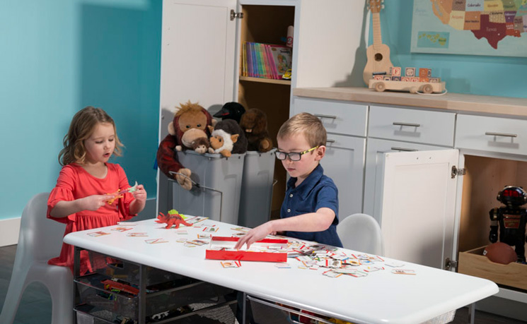 Use waste bins for toy storage